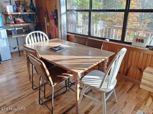 dining area featuring light wood-type flooring