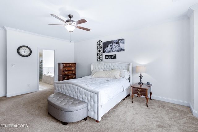 bedroom featuring ceiling fan, ornamental molding, light colored carpet, and ensuite bath