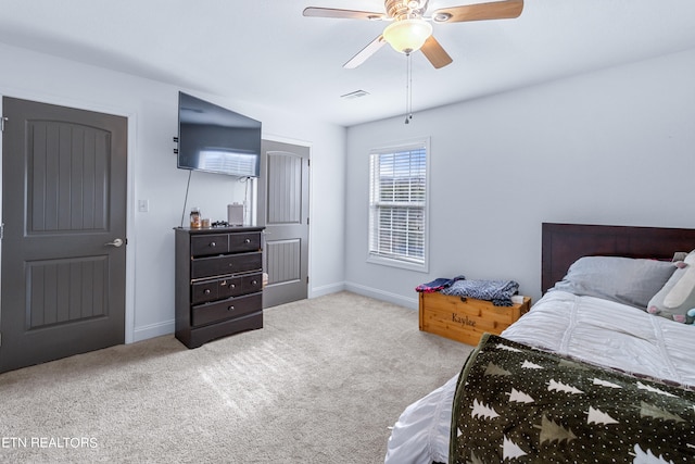 carpeted bedroom featuring ceiling fan