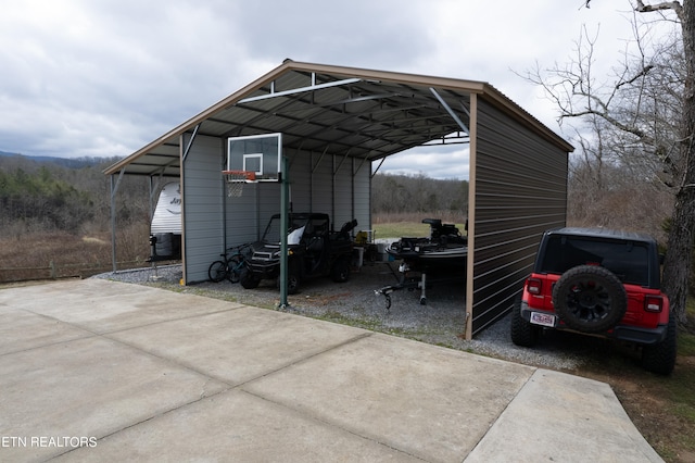 view of parking / parking lot with a carport