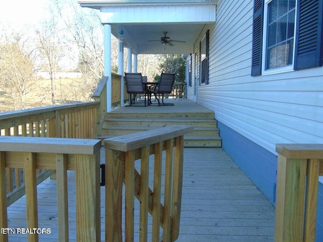 wooden terrace with ceiling fan