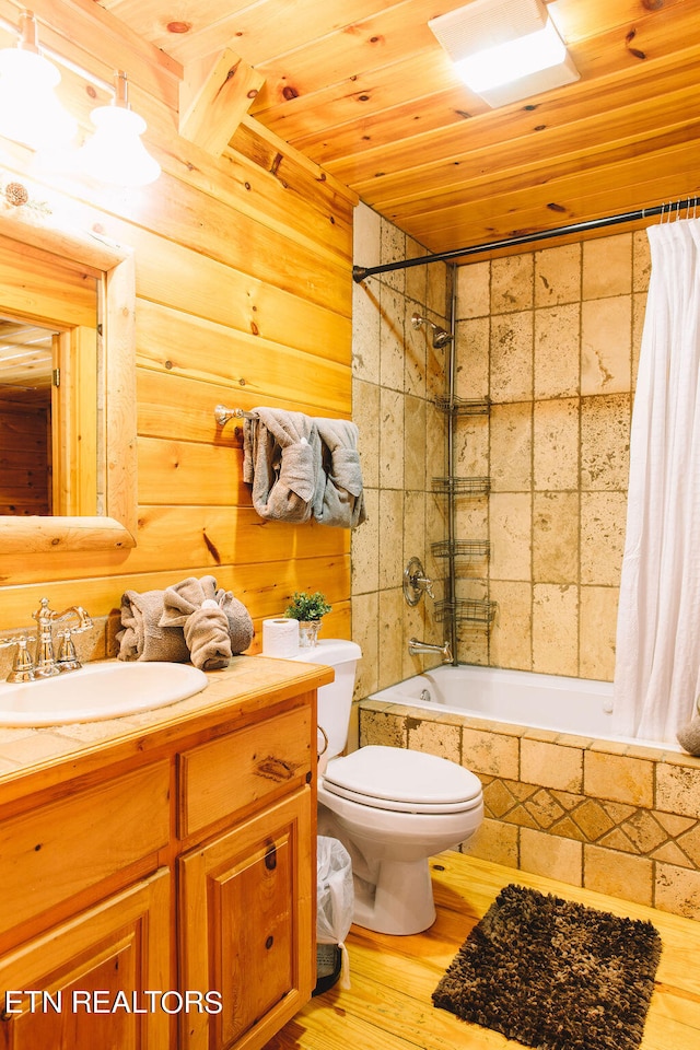 full bathroom featuring toilet, hardwood / wood-style flooring, wooden ceiling, vanity, and shower / bath combination with curtain