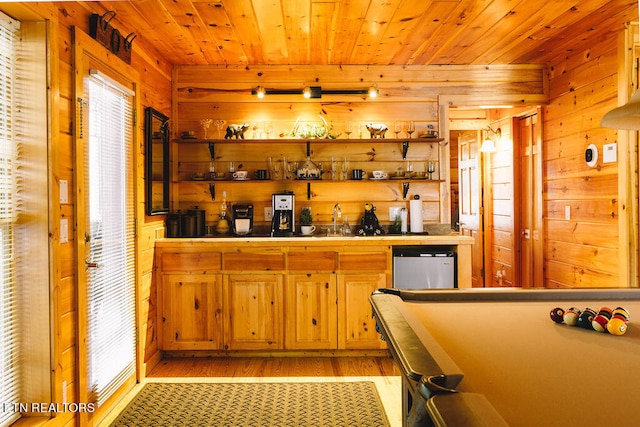 bar with wood walls, pool table, refrigerator, wooden ceiling, and light wood-type flooring