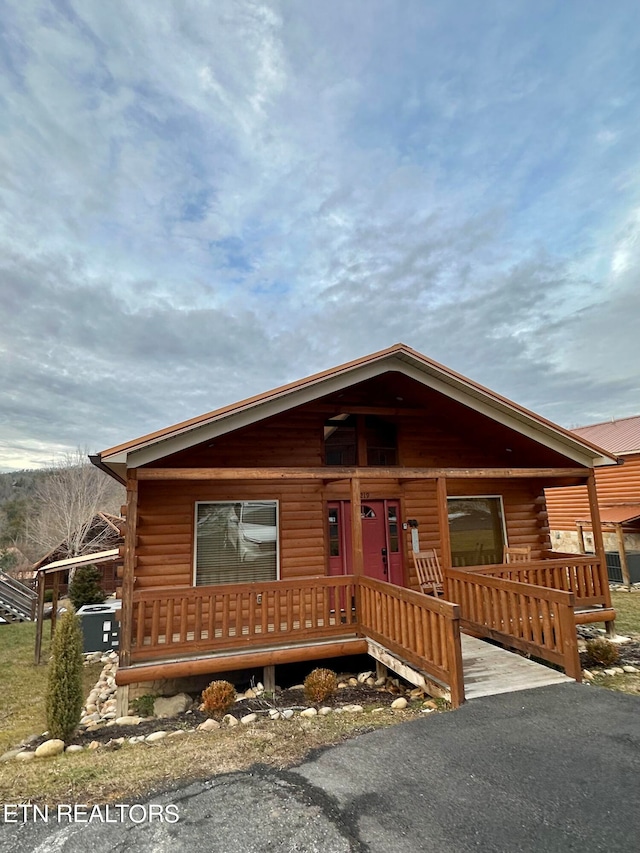 cabin with covered porch