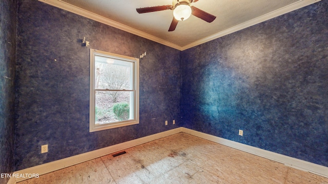 unfurnished room featuring ceiling fan and crown molding