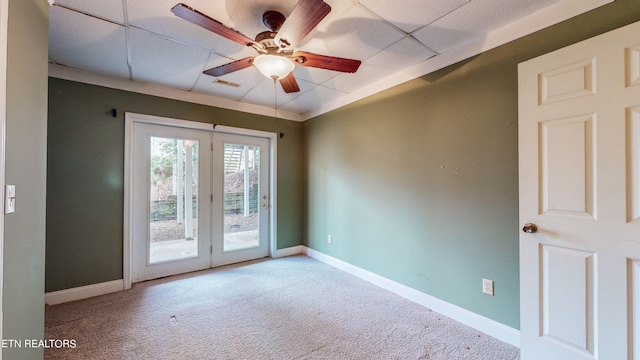 spare room with ceiling fan and carpet floors