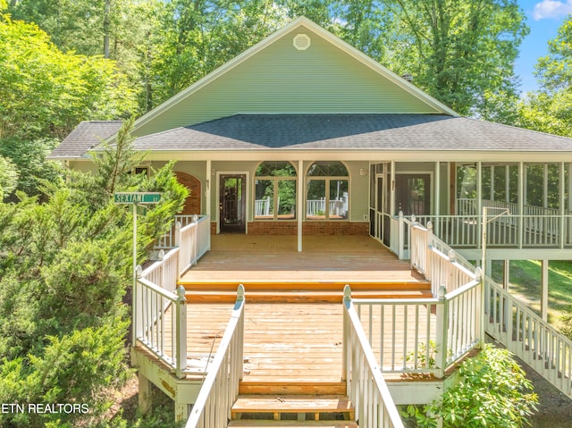 exterior space featuring a wooden deck