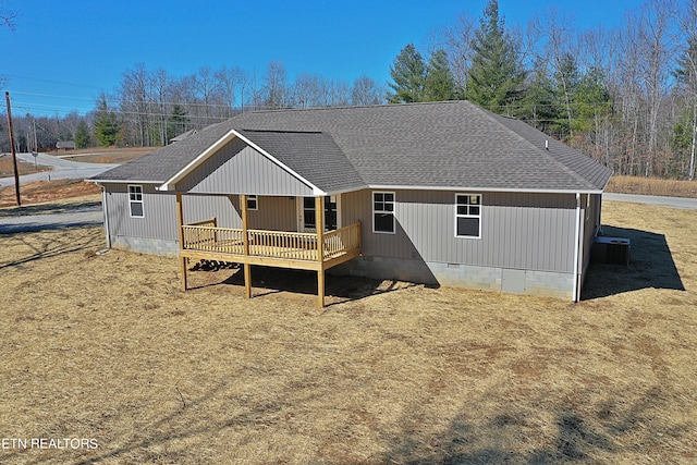 rear view of property with a deck