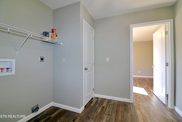 clothes washing area featuring electric dryer hookup, hookup for a washing machine, and dark wood-type flooring