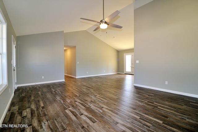 unfurnished room featuring ceiling fan, dark hardwood / wood-style floors, and high vaulted ceiling