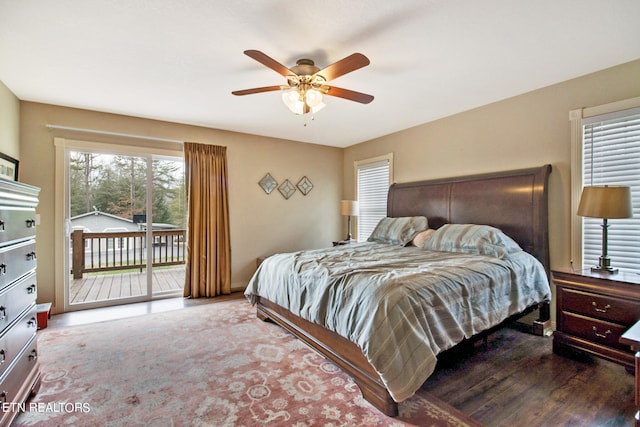 bedroom featuring ceiling fan, dark hardwood / wood-style floors, and access to exterior