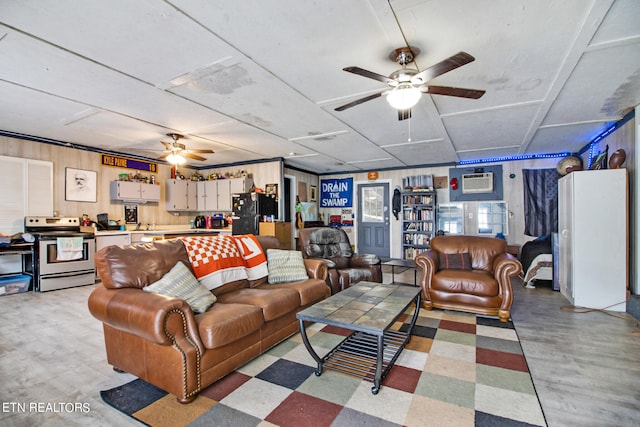 living room with light hardwood / wood-style flooring and ceiling fan