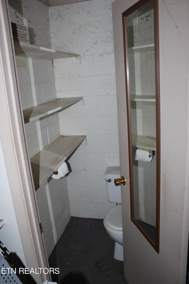 bathroom featuring toilet