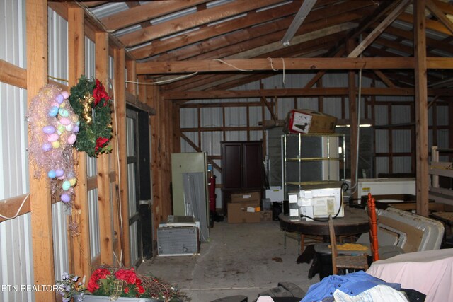 misc room with lofted ceiling