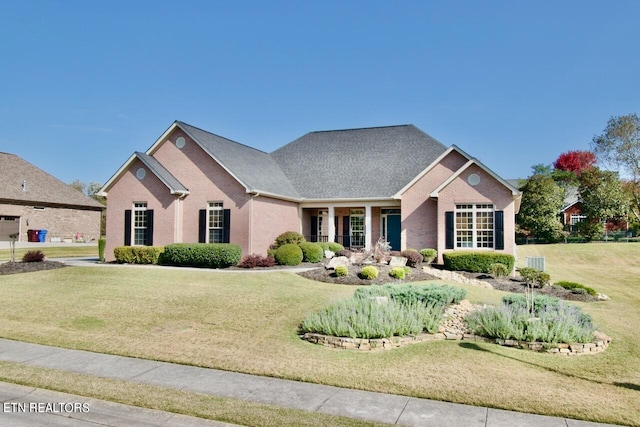 view of front facade with a front lawn