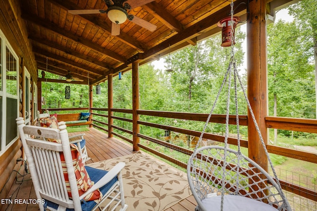 wooden deck with ceiling fan