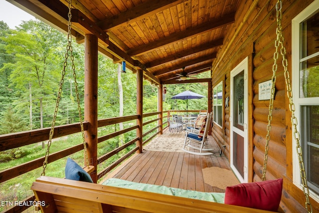 wooden terrace with ceiling fan