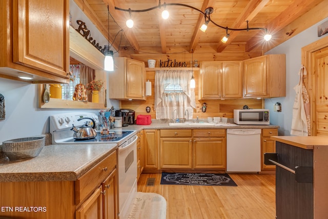 kitchen with light hardwood / wood-style flooring, hanging light fixtures, white appliances, and beamed ceiling