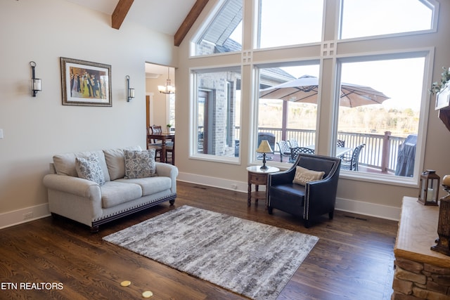 living room with high vaulted ceiling, a notable chandelier, dark hardwood / wood-style floors, and beam ceiling