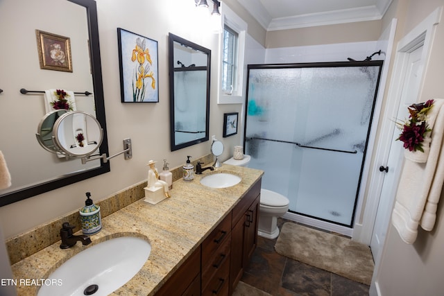 bathroom with tile flooring, dual sinks, toilet, vanity with extensive cabinet space, and an enclosed shower