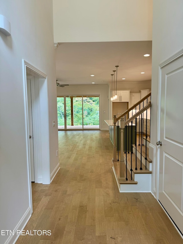 hall with light wood-type flooring