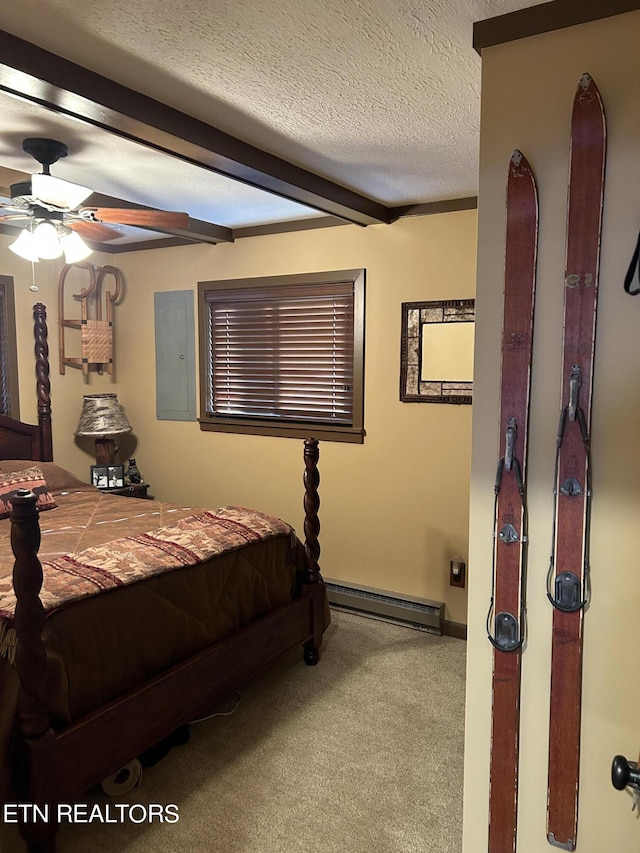 bedroom with baseboard heating, a textured ceiling, ceiling fan, and carpet floors