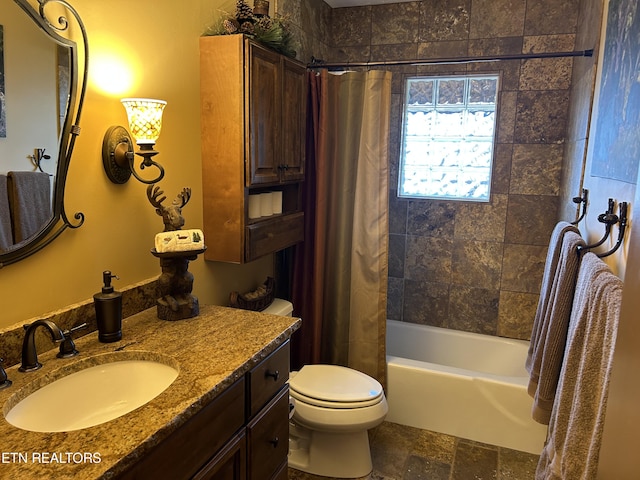 full bathroom featuring vanity, tile floors, toilet, and shower / bathtub combination with curtain