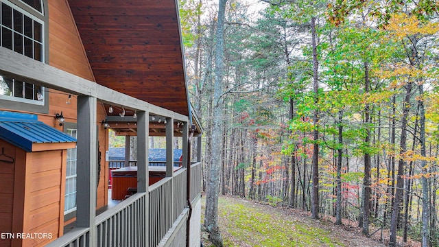 exterior space featuring a hot tub