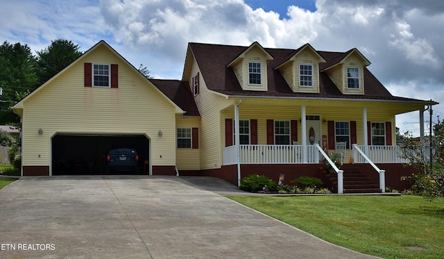 cape cod-style house with a front yard, a garage, and a porch