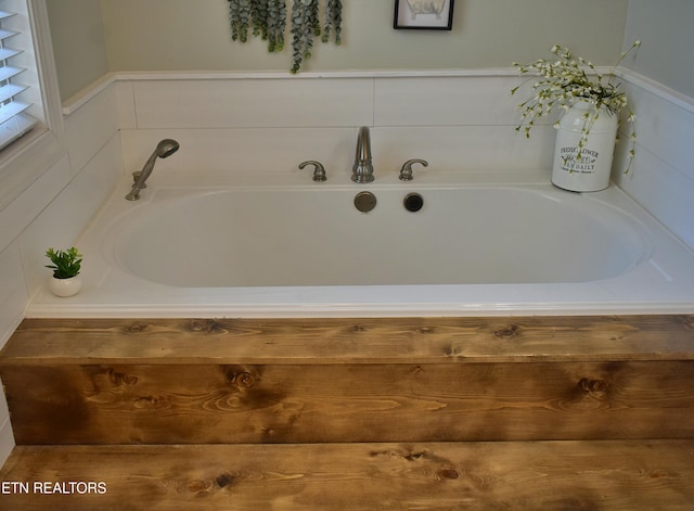 full bath featuring a garden tub