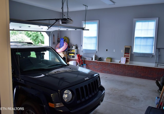 garage featuring a garage door opener