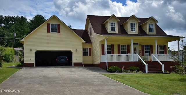 cape cod house featuring a garage, a front yard, and covered porch