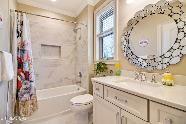 full bathroom featuring plenty of natural light, toilet, vanity with extensive cabinet space, and ornamental molding