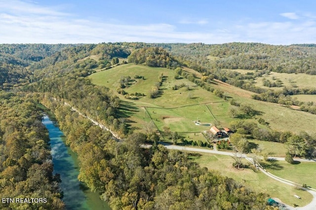 bird's eye view featuring a rural view and a water view