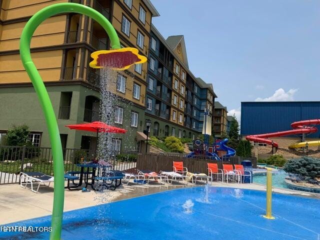 view of swimming pool featuring a patio