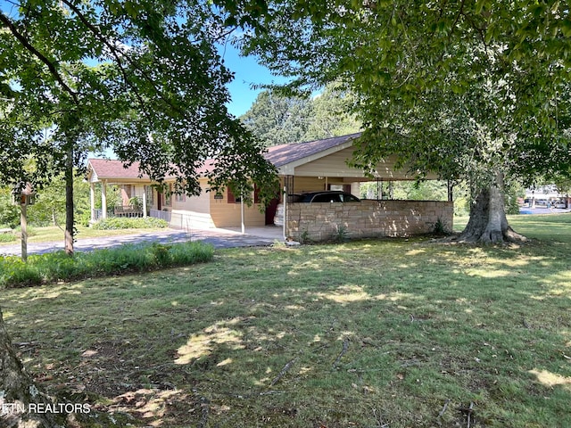 view of yard with a carport