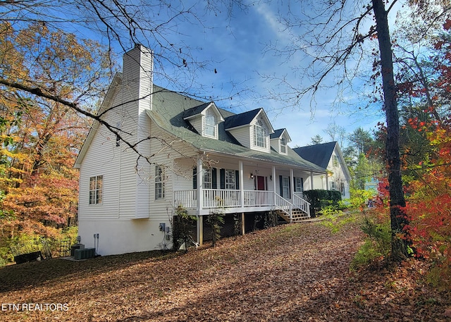 view of property exterior with a porch