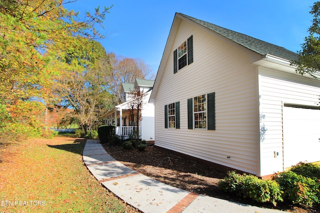 view of home's exterior featuring a garage