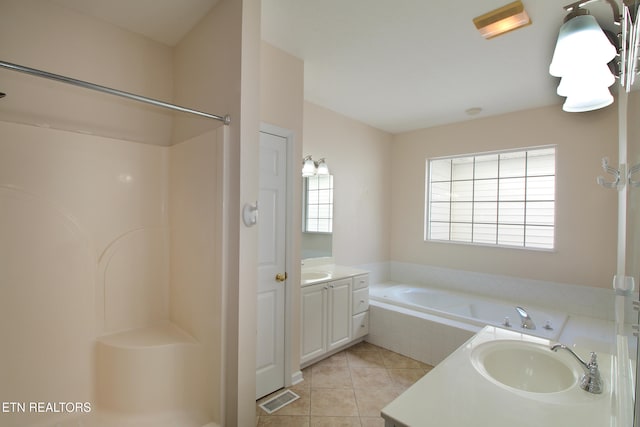 bathroom featuring tile patterned flooring, vanity, and independent shower and bath