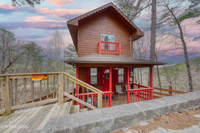 view of front of property with a deck