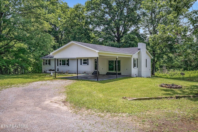 ranch-style home with a front yard