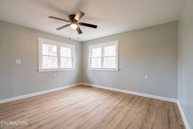 unfurnished room with ceiling fan and light hardwood / wood-style floors