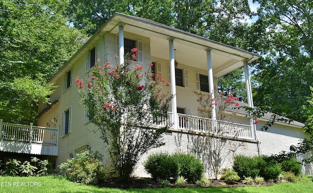 view of home's exterior featuring a porch