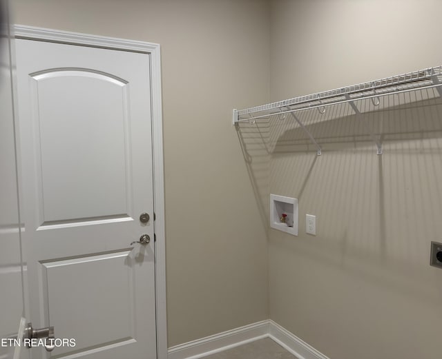 laundry room with hookup for an electric dryer and hookup for a washing machine