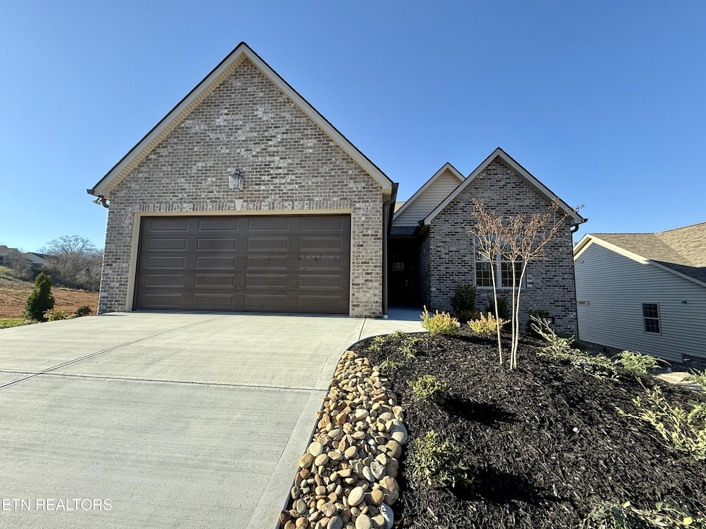 front facade with a garage