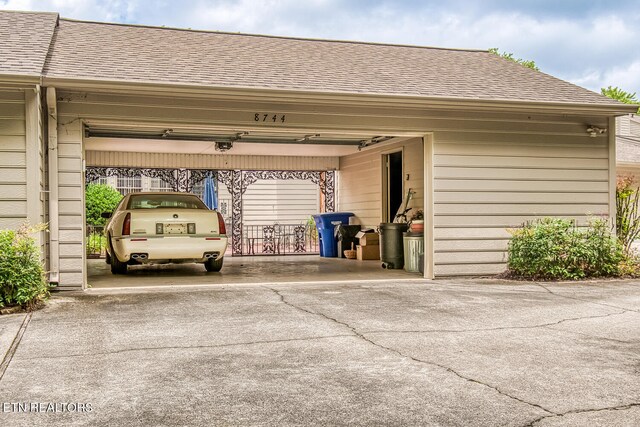 garage with a carport