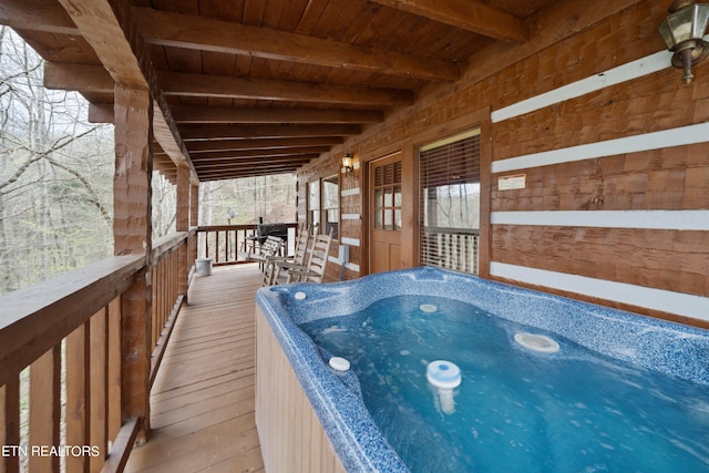 view of pool with area for grilling and an outdoor hot tub