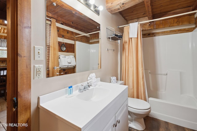 full bathroom with shower / bath combo with shower curtain, vanity, hardwood / wood-style flooring, wood ceiling, and toilet