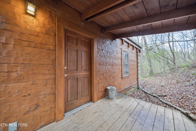 entrance to property with a deck