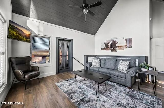 living room with dark hardwood / wood-style flooring, high vaulted ceiling, and ceiling fan